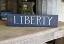 Liberty with Stars Sign