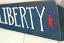 Liberty with Stars Sign