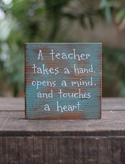 A Teacher Takes a Hand Shelf Sitter Sign