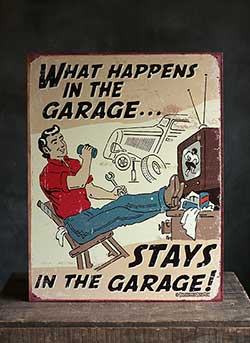 What Happens in the Garage Tin Sign