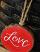 Red Love Hand-Lettered Wood Slice Ornament, by Our Backyard Studios in Mill Creek, WA