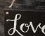 Love Wood Sign, hand painted by Our Backyard Studio of Mill Creek, WA